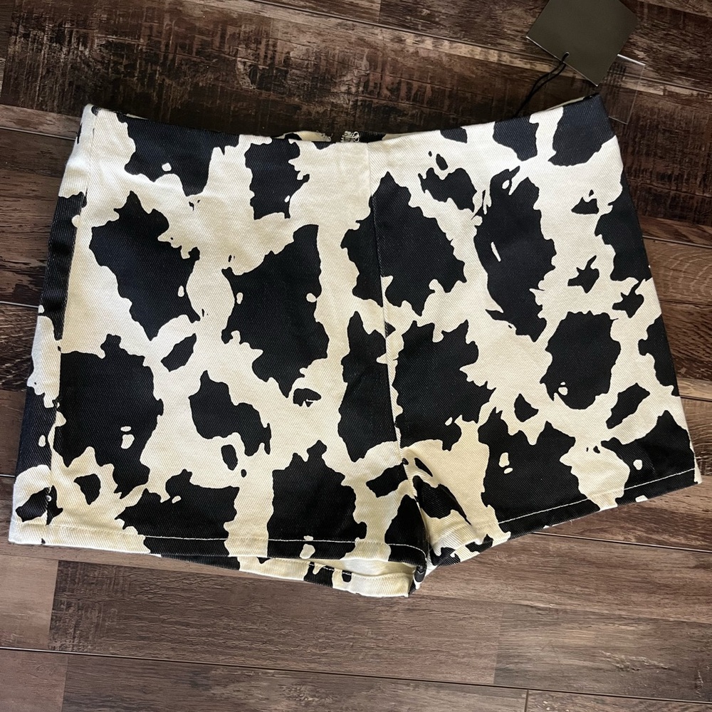 Cow print denim shorts